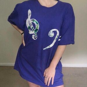Purple Graphic T-Shirt with Musical Note Design